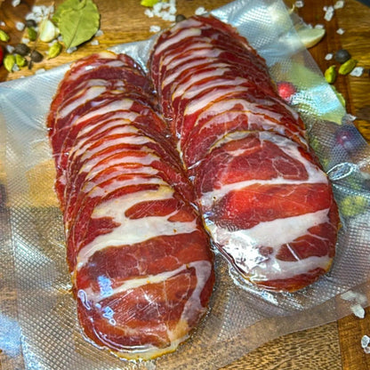 Vacuum-sealed sliced capocollo style cured pork – Ukrainian Smokehouse