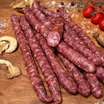 Hunter's Style Sausages thin dry-cured sticks on wooden board – Ukrainian Smokehouse